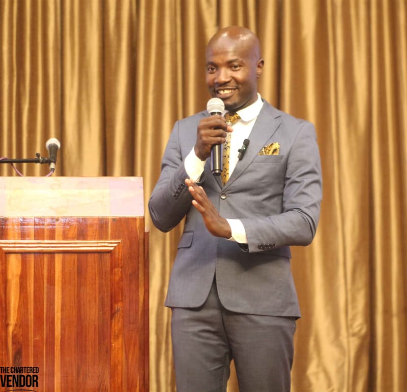 Jerry Nyazungu: Speaking, grey suit