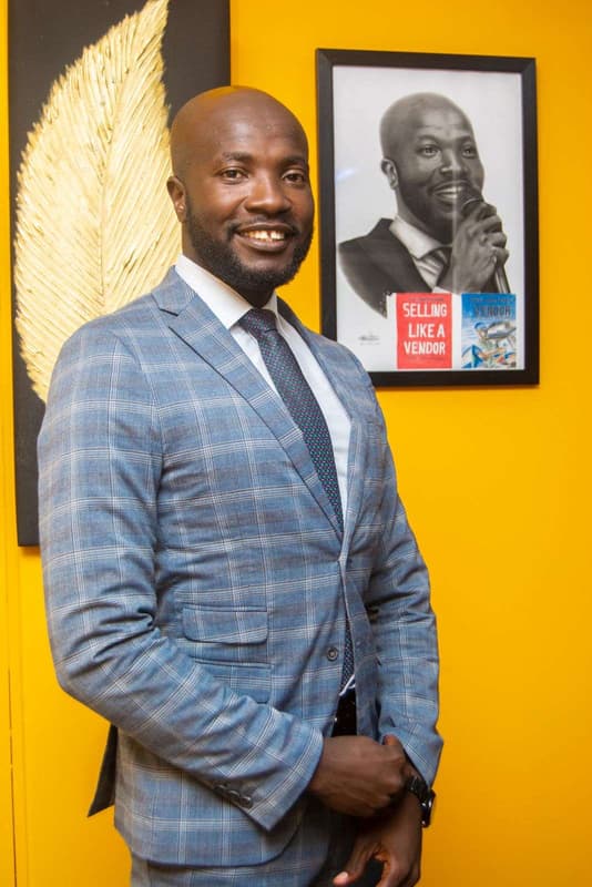 Jerry Nyazungu: Portrait, check suit